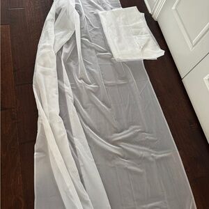 2 Panels of 59x83 inches White Sheer Curtains